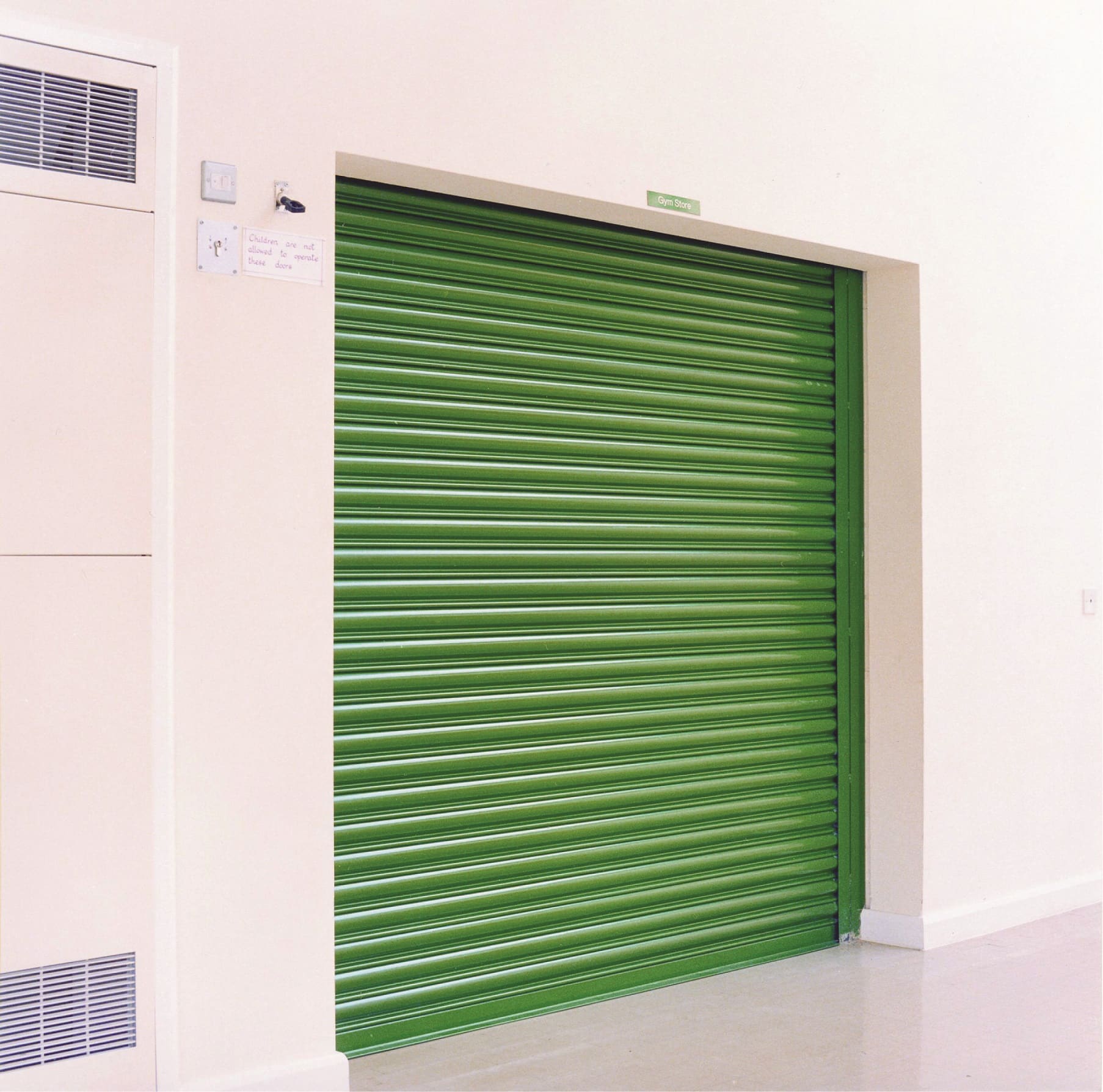 Fire Roller Shutter - Arrow Security Shutters Limited Green Fire Rated Roller Shutter - Arrow Security Shutters Limited