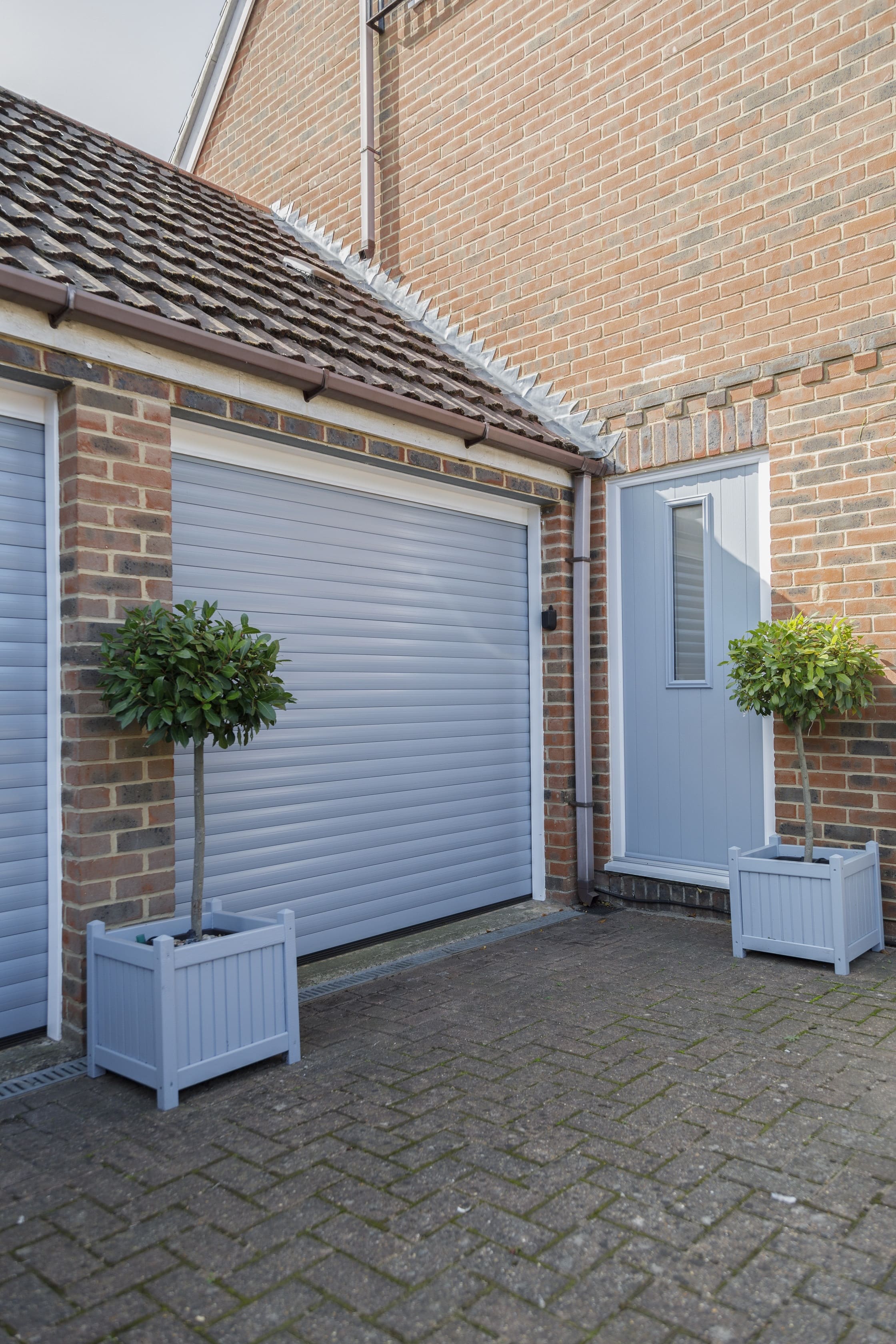 Roller Garage Door - Arrow Security Shutters Limited Woodgrain Golden Oak Roller Garage Door - Arrow Security Shutters Limited